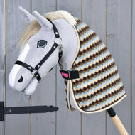 Pastel argyle stable blanket worn by a grey Hobby Horse, with cream neck trim
